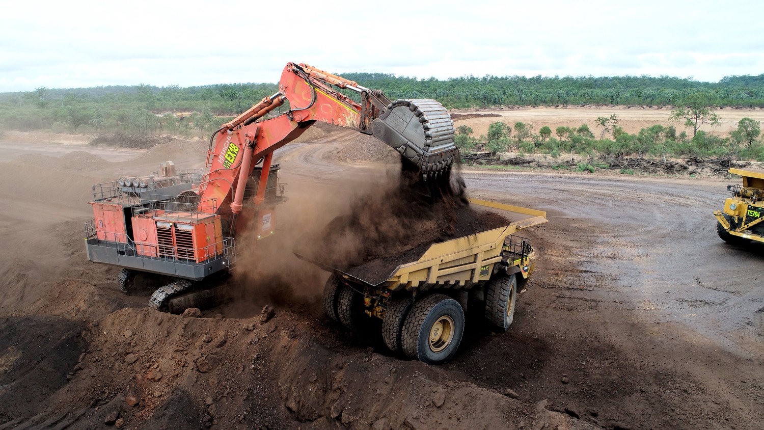 Hitachi excavator loading a haul truck